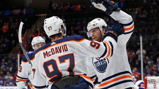 Neal scores 4 to lead Oilers to 5-2 win over Islanders