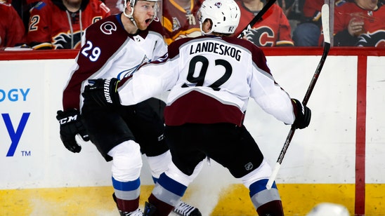 MacKinnon scores in OT, Avalanche beat Flames to even series