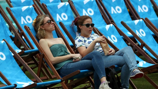 The Latest: Djokovic's win wraps up opening day in Melbourne