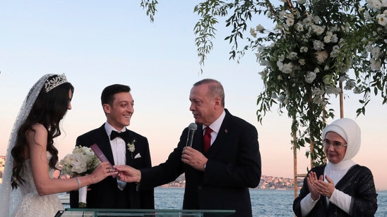 Turkey's Erdogan witness in footballer Mesut Ozil's wedding