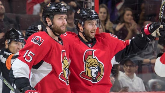 Senators end losing streak beat Devils