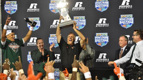 Hurricanes Overcome Slow Start, Down WVU 31-14 to Win Russell Athletic Bowl