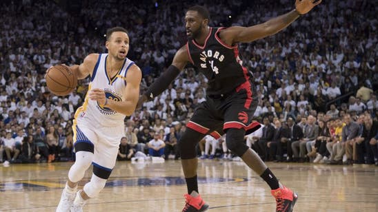 Warriors hold off relentless Raptors at home