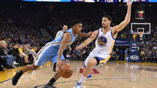 Green's triple-double lifts Dubs over Nuggets