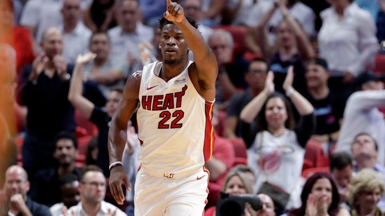 Butler makes his Miami debut, Heat top Hawks 112-97