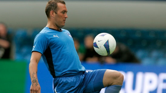 Former Netherlands defender Fernando Ricksen dies at 43