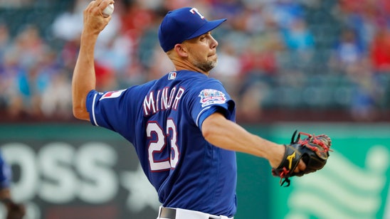 Minor stays with Rangers and stops Mariners' win streak, 9-7