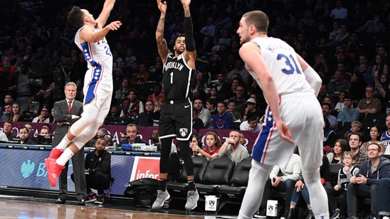 Russell scores 21, Nets defeat sloppy Sixers 122-97