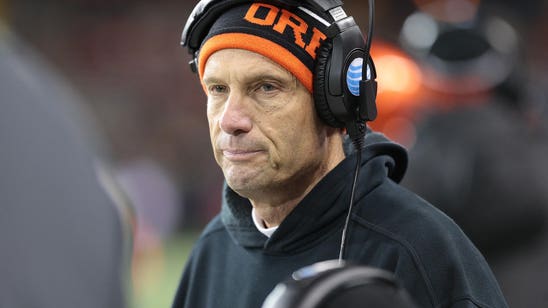 Woman sues Oregon St., ex-coach Riley over alleged sexual assault