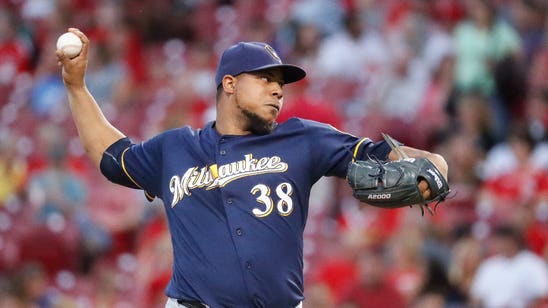 Peralta retires 15 straight for Brewers in shutout loss to Reds