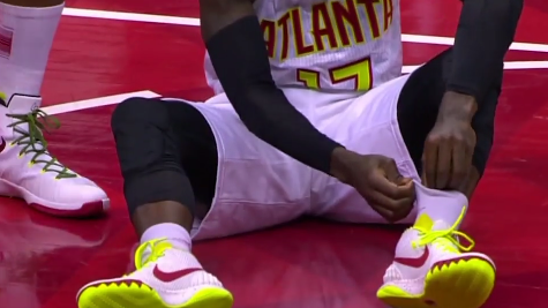 Watch: Hawks' Dennis Schroder gets tooth knocked out, stuffs it in sock for safekeeping