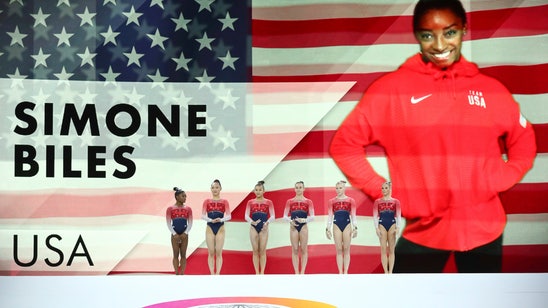 Biles sets record as US wins world gymnastics team gold