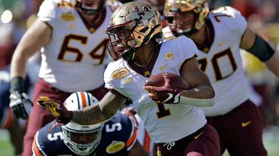 Johnson lifts No. 16 Minnesota over No. 9 Auburn in Outback