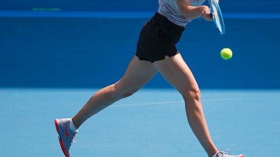 The Latest: Kevin Anderson works late at Australian Open