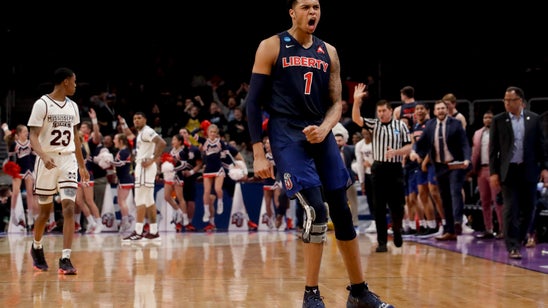 Liberty upsets Mississippi St. 80-76 for 1st tourney win