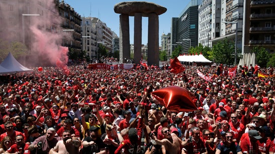 The Latest: English fans fill Madrid ahead of CL final