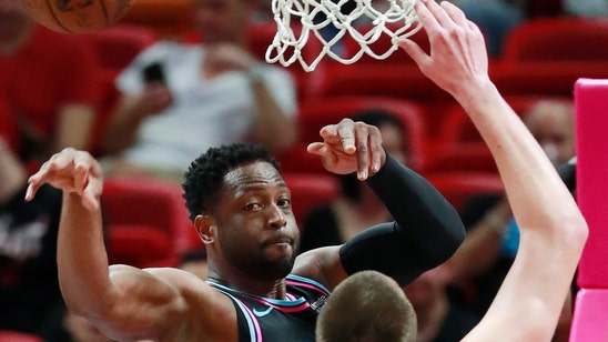 Jokic has triple-double, Nuggets top Heat 103-99