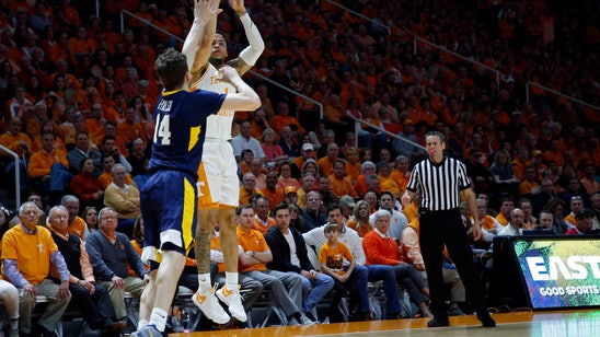 No. 1 Vols beat West Virginia 83-66 for 14th straight win