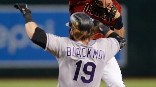Melville goes 7 strong, Rockies roll over D-backs 7-2