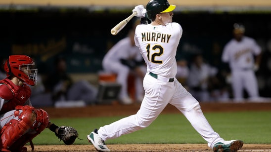 Murphy homers for 1st hit in MLB debut, A's blank Angels 4-0