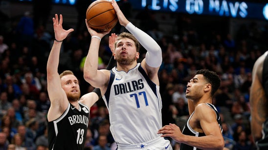 Doncic helps Mavs pull away in 4th for 123-111 win over Nets