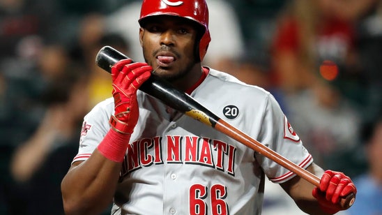 Ervin ties Reds' record with 6 hits in 17-9 win over Rockies