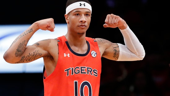 Doughty helps No. 18 Auburn rout New Mexico 84-59