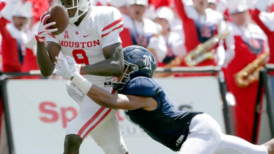 King rallies Houston to 45-27 victory over Rice