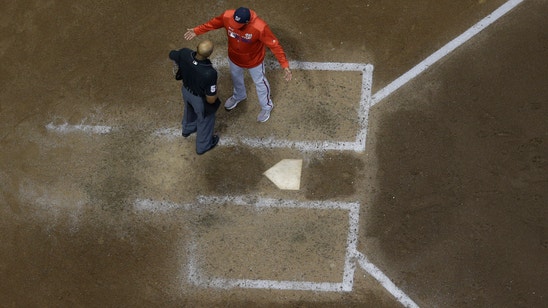 LEADING OFF: Reds deal with odd delays, Rendon miffed