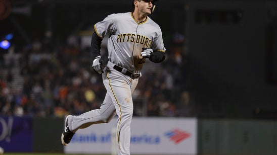 Pirates hit 3 HRs to back Nova in 10-5 win over Giants