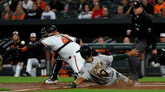 Khris Davis hits 2 HRs, Chris Davis hitless, A’s thump O’s