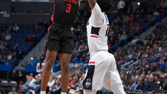 No. 9 Houston beats UConn 71-63 for 9th straight victory.
