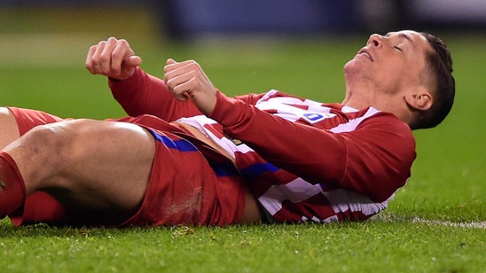 Video: Atletico Madrid's Fernando Torres suffers 'traumatic brain injury' in collision