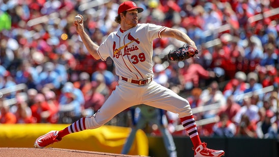 Mikolas leads Cardinals with arm and bat, beats Mets 10-2