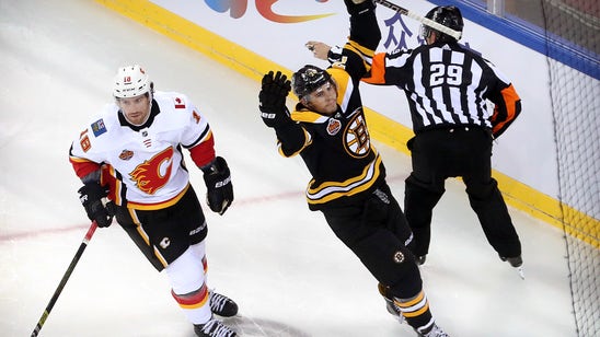 Boston Bruins douse Calgary Flames 3-1 in Beijing