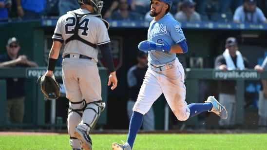 Merrifield singles in run in 10th, lifting Royals over Yanks