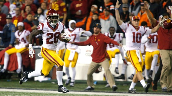 Ware runs for 205 yards, 3 TDs as USC beats Oregon St. 38-21