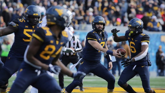 Grier throws for 3 TDs, No. 7 West Virginia beats TCU 47-10