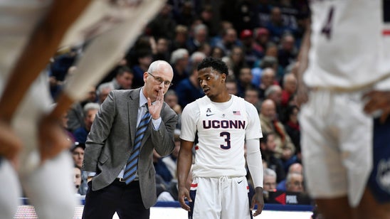 Adams, Gilbert lead UConn past SMU 76-64
