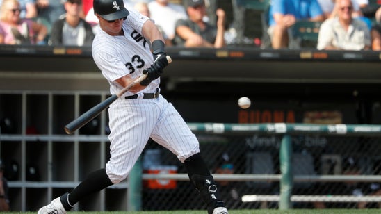 McCann grand slam in 8th powers White Sox past Astros 13-9