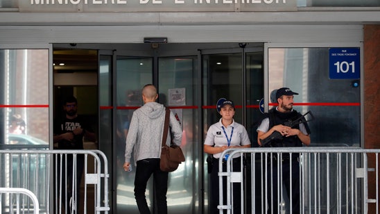 The Latest: Blatter says Paris meeting swayed vote for Qatar