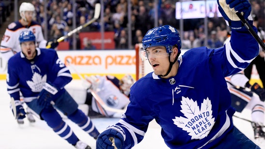 Johnsson scores twice, Leafs use 4-goal second to top Oilers
