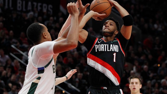 McCollum scores 40 as Trail Blazers beat Bucks 118-103