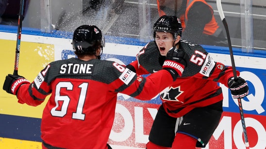 Canada, Finland advance to world hockey title game