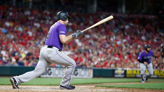 Murphy ties career high with 6 RBIs, Rockies rout Reds 12-2