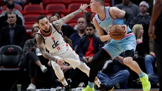 Butler's triple-double helps Heat past Wizards, 112-103