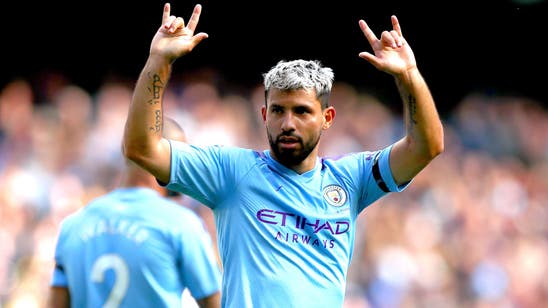 Laporte injury mars Man City's 4-0 win over Brighton
