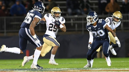 Midshipmen stay afloat in AAC title race with rout of UConn
