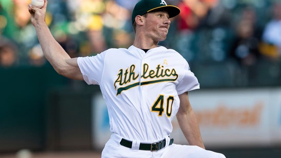 Bassitt fans 11, A's hit three HRs in 10-2 win over Tigers