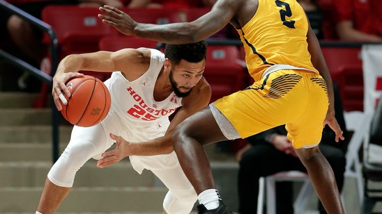 No. 21 Houston improves to 12-0, routing winless Coppin St